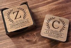 two personalized wooden stamps with the letter z and an image of a wreath on them