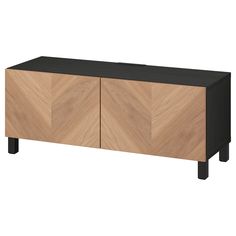 the sideboard is made from wood and has two doors, one with black handles