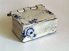 a white and blue box sitting on top of a table