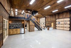 the inside of a building with wood paneling and metal railings on the ceiling