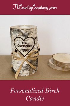 the personalized birch candle is on display