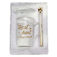 a cup and spoon in a box with the words'best mom ever'on it