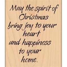 a wooden plaque that says, may the spirit of christmas bring joy to your heart and happiness to your home