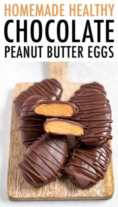 chocolate peanut butter eggs on a wooden cutting board with text overlay that reads homemade healthy chocolate peanut butter eggs