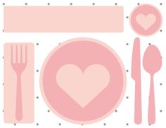 a pink table setting with hearts on the plate and utensils in front of it