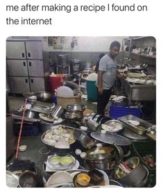 a man standing in a kitchen filled with lots of pots and pans on top of a counter