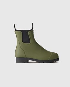 You, 1. Rainy days, 0. Introducing our more eco-friendly Waterproof Ankle Rain Boot. Made with natural rubber and recycled neoprene, these rain boots not only keep your feet dry when wet weather rolls in, but they're also sleek and modern feeling.  | Quince | Women's Waterproof Ankle Rain Boot in Olive, Size 7, Natural Rubber Rain Shoes Women, Short Rain Boots, Ankle Rain Boots, Rain Shoes, Rain Boot, Wet Weather, Just Run, Rainy Days, Natural Rubber