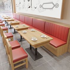 an empty restaurant with red booths and wooden bench seating, along with a large drawing on the wall