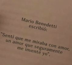 a close up of a piece of paper with an italian poem written in black on it