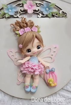 there is a small figurine that has a little fairy on it's back