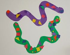 the paper snake is made to look like it's coming out of its mouth