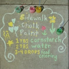 sidewalk chalk drawing with markers and crayons on it