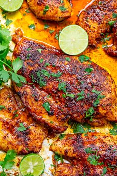 grilled chicken with cilantro sauce and limes