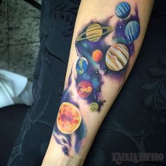 an arm with different planets on it