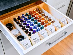 the drawers are filled with different types of paint