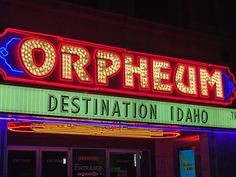 a neon sign that reads orphem destination idaho