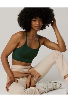 THE LOOK: Classic length.Buttery-soft Real Me® fabric./THE FEEL: Medium-to-high support. Extra-supportive bonded band for a secure fit. Cups that mold to you./THE MOVES: Think sweat sesh, group workout class, or afternoon run./Accessibility deets: Group Workout, Green Sports Bra, Green Sports, Aerie Real, Athletic Fit Jeans, Offline By Aerie, Quarter Zip Jacket, Jean Trends, Group Fitness