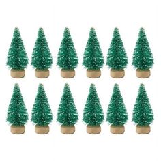 twelve small green christmas trees sitting on top of each other