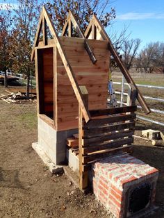 a small building made out of bricks and wood