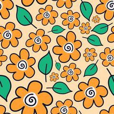 an orange flower pattern with green leaves and swirls