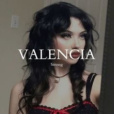 a woman with long black hair wearing a red and black bra over her top that says valencaia strong