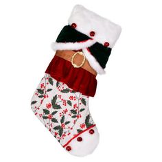 a christmas stocking hanging from the ceiling with stockings on it's legs and red trimmings