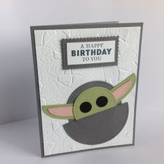 a handmade birthday card with a baby yoda