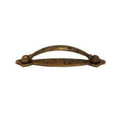 an antique brass drawer pull handle on a white background