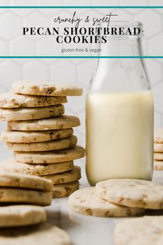 a bottle of milk and some cookies on a table with the words pecan shortbread cookies