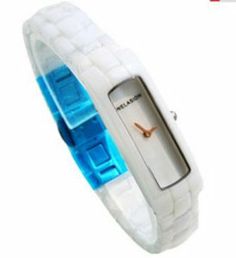 a white and blue watch on a white wristband with an orange second hand in the middle