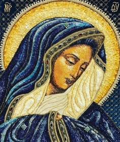 the virgin mary is depicted in this mosaic art work, which features blue and gold colors