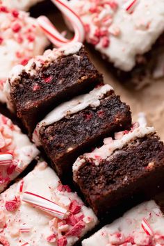 chocolate peppermint brownies with white frosting and candy canes on top