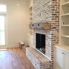 an instagramted photo of a brick fireplace