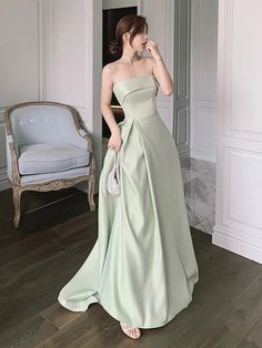 Solid Dresses For Banquet During Party Season, Satin Prom Dress In Solid Color, Satin Mini Dress For Banquet During Prom Season, Elegant Green Strapless Dress For Banquet, Green Strapless Evening Dress For Banquet, Solid Color Dresses With Fitted Bodice For Prom, Solid Color Prom Dress With Fitted Bodice, Strapless Banquet Gown, Floor-length Mini Dress For Wedding And Prom Season