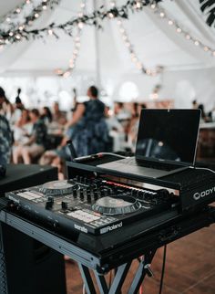 a dj's turntable in the middle of a party