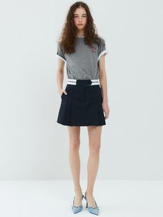 This soft skirt with the perfect pop of pretty.A smooth fabric with comfort stretch and a soft texture.Our fabric gives these skirt flexible comfort and it hugs your silhouette. - Lovely and cute mini skirt - Brand logo on the belt - Side zip closure and belt loops - Whether you add a tee or a blazer, you'll have plenty of pairing options with this chic style- It's soft and comfy with soft polyester blend Casual Elastane Pleated Skirt, Casual Pleated Elastane Skirt, Stretch Mini Pleated Skirt For Workwear, Pleated Elastane Mini Tennis Skirt, Pleated Elastane Tennis Skirt, Pleated Mini Tennis Skirt In Elastane, Pleated Tennis Skirt In Elastane, Flowy Mini Skort With Lined Skirt, Flowy Lined Mini Skort