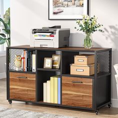 an office desk with drawers and printer on top