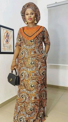 Description: This magnificent Anakara (Wax print ) African dress is perfect for any occasion you want to look your best. its a FULL DRESS WITH HEADWRAP ONLY. Important Note: THIS WAX PRINT NNEXT TO THE STYLE WE POSTED  WILL  BE USE WITH ORANGE BROIDERIE FOR THIS STYLE   You can always request to see other color wax print after you place your order by sending us a message along with your order. PROCESSING: We usually take 3-4  BUSINESS DAYS to make the dress. SHIPPING: We use DHL shipping with tracking and text update. (3 to 5 days) SIZING: What we need from you We have a sizing Chart in the images. Scroll to the right. (Providing your desire measurements for proper fitting ) BUST WAIST HIP SHOULDER SLEEVE LENGTH ARMHOLE Shoulder to waist Length of dress from shoulder to hem Length of skirt Ankara Agbada Styles For Women, Adire Designs, A Shape Gown Ankara, Kaftan Styles For Ladies, Kampala Gown Styles For Ladies, Boubou Styles For Women, Kaftan Styles, Bubu Gown Styles, African Fashion Week