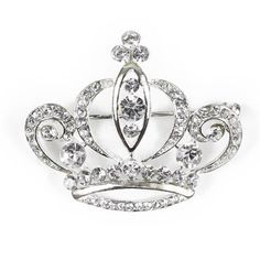 This Rhinestone Crown Crystal Brooch features a grand crown style. Versatile and ready to use for floral centerpieces, displays, and crafts. Le Prise™ | Le Prise™ Fazeley Rhinestone Crown Crystal Brooch 1.3 H x 1.6 W x 0.3 D in brown / gray / whiteGlass | 1.3" H X 1.6" W X 0.3" D | Wayfair Cheap Silver Crystal Brooches, Silver Crystal Pins For Wedding, Wedding Flower-shaped Rhinestone Jewelry, Silver Rhinestone Wedding Crown, Rhinestone Crown, Silver Flower-shaped Brooches With Rhinestones, Crystal Brooch, Floral Centerpieces, Brown And Grey