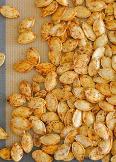 roasted pumpkin seeds on a baking sheet