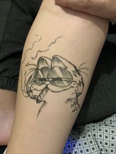 a person with a tattoo on their arm