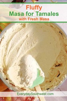 a close up of a bowl of masa on a table with text overlay that reads fluffy masa for tamales with fresh masa