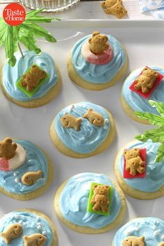 cookies decorated with blue icing and teddy bears