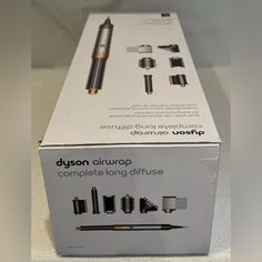 100% Authentic! New In Open Box Dyson Airwrap Complete Long Diffuse Multi-Styler For Curly And Coily Hair The New Dyson Airwrap Complete Long Diffuser Is Engineered For Curly And Coily Hair. New Diffuser And Large Round Volumizing Brush Attachment. Dry, Curl, Shape, Smooth And Hide Flyaways With No Heat Damage. - Dries And Styles Simultaneously Using The Coanda Effect, Not Heat Damage - Six Versatile Attachments Engineered For Styling Curly And Coily Hair - 2-In-1 Coanda Smoothing Dryer Dries, S New Dyson Airwrap, Hair Color Silver, Dry Curl, Dyson Airwrap Complete, Dyson Airwrap, Coily Hair, Heat Damage, No Heat, Open Box