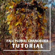 the fall floral chandelier is made with dried leaves and berries hanging from it's branches