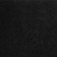 a black cloth textured with white stitching