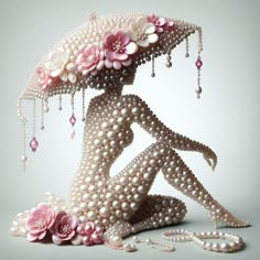 a woman made out of pearls and flowers