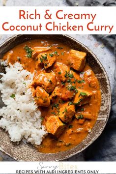 a bowl filled with rice and chicken curry