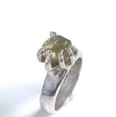 This anatomical hand shaped ring proudly displays a natural bright yellow tourmaline crystal. This ring is made of 925 sterling silver. Meticulous care has been put into the small details, like fingernails on the hands and tendons in the wrist, which means you'll have an un-paralleled work of art to show off to all of your friends. These pieces are the first in a series of anatomically correct wearable art, unique in the jewelry market.  All items are hand-carved in wax and cast using the lost w Wax Carved Ring, Wax Casting Jewelry, Lost Wax Jewelry, Cast Rings, Jewelry Market, Wax Ring, Jewellery Design Sketches, Carved Ring, Ring Making