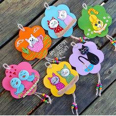 colorful wooden tags with cartoon animals on them